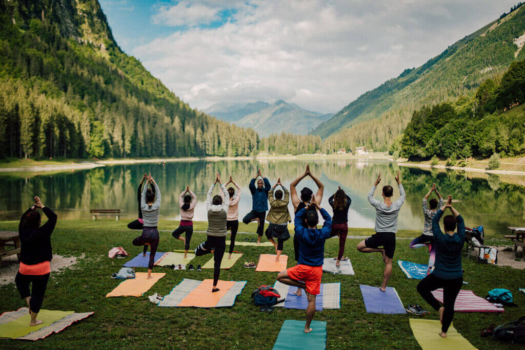 yoga retreat by mountain lake in the french alps