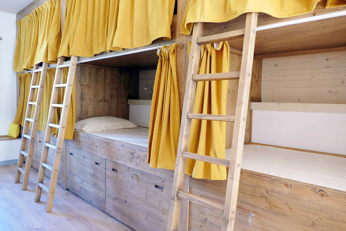 Bunk bed dorm in Sanskriti yoga retreat centre in Scionzier