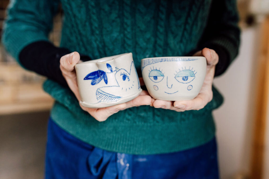 Two cute handmade pottery mugs