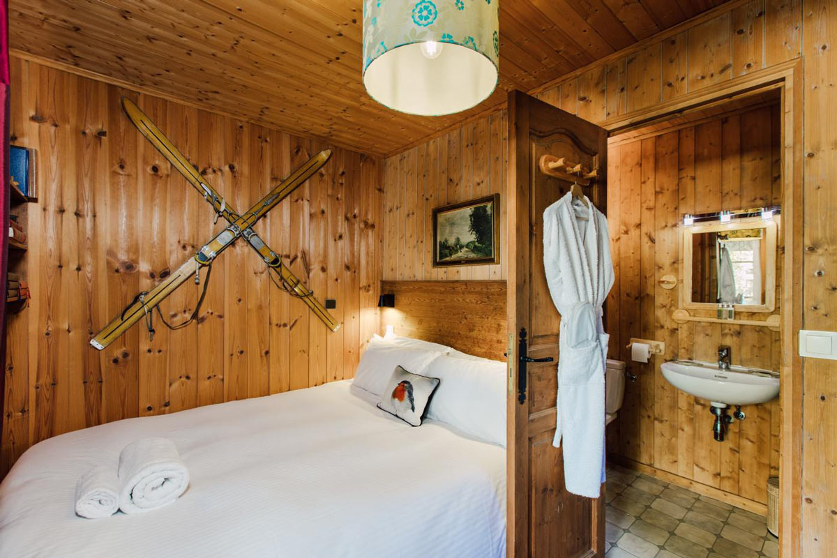 Cottage One, authentic bedroom in the Farmhouse hotel in Morzine