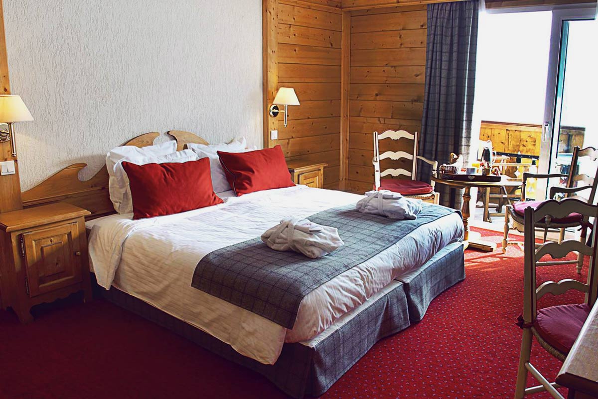 Traditional alpine hotel room in Les Gets