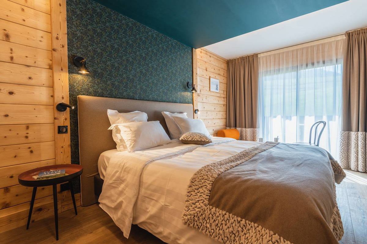 Modern bedroom in La Marmotte hotel in the Alps
