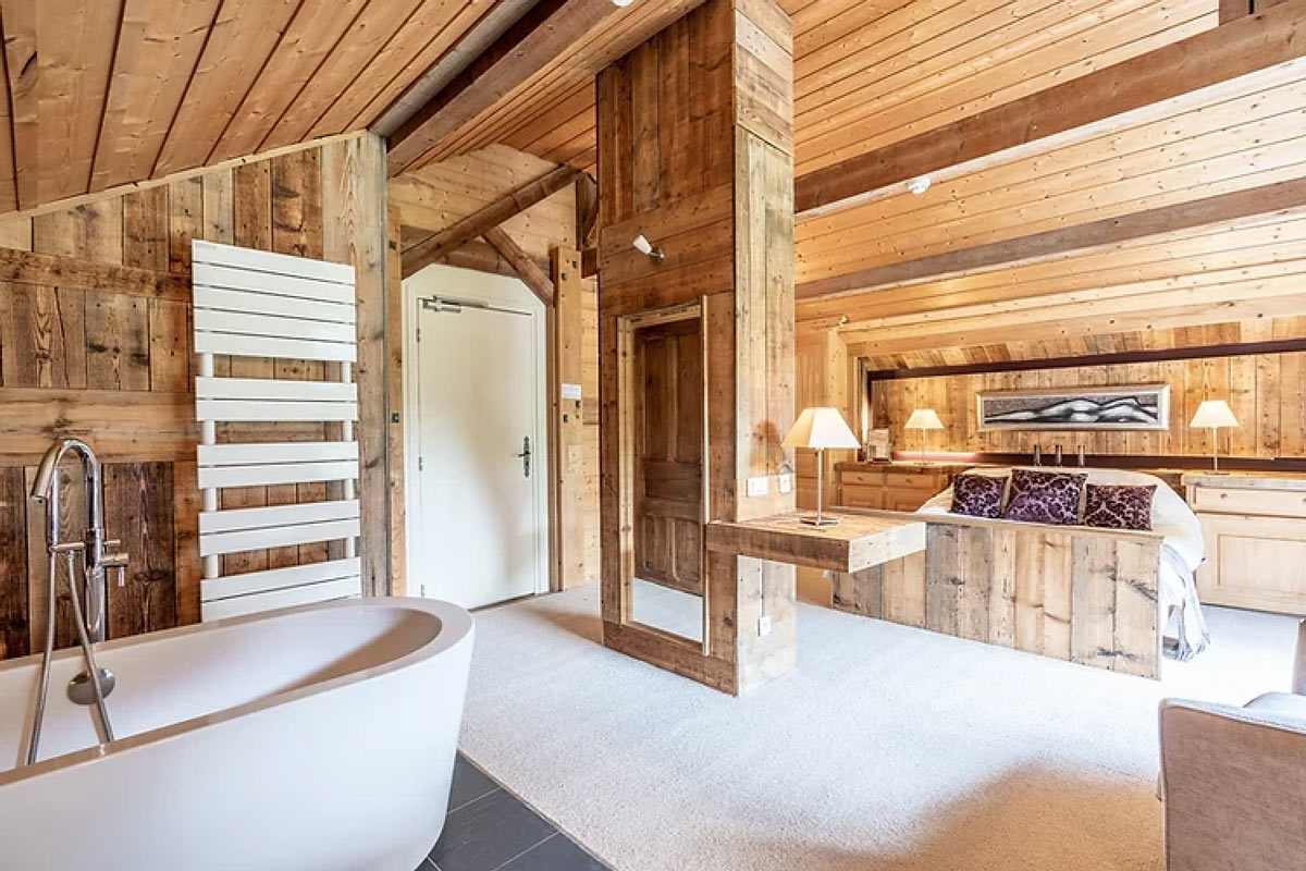 double bedroom with ensuite bathroom in chalet sixtine