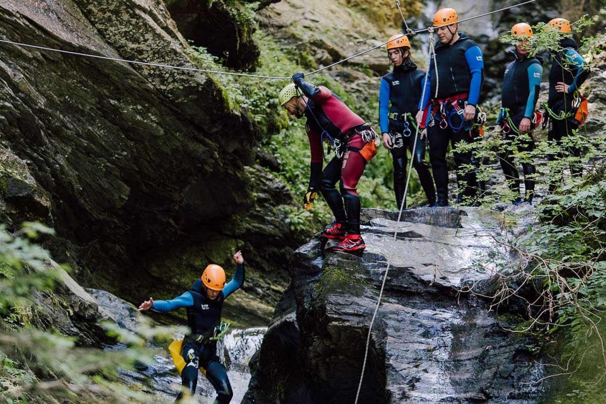 mother and daughter canyoning in the french alps