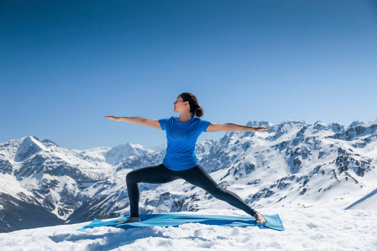 Claudia Lamas Cornejo practising Iyengar yoga in the Swiss Alps in Winter