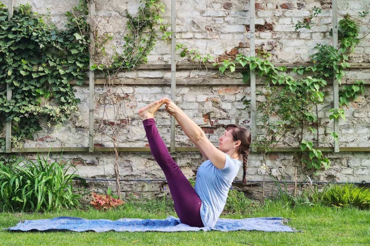 Claudia Lamas Cornejo practising restorative Iyengar yoga on a yoga retreat