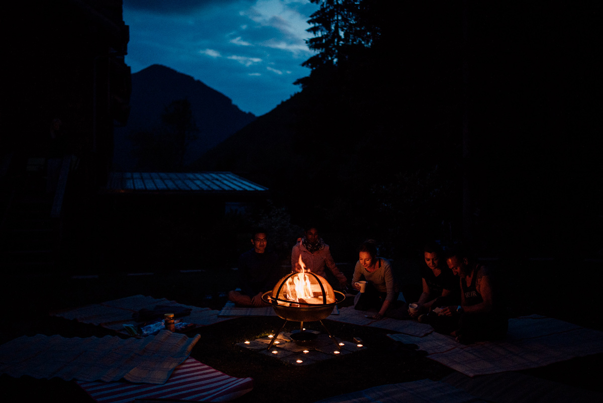 Campfire on mother daughter retreat in the Alps