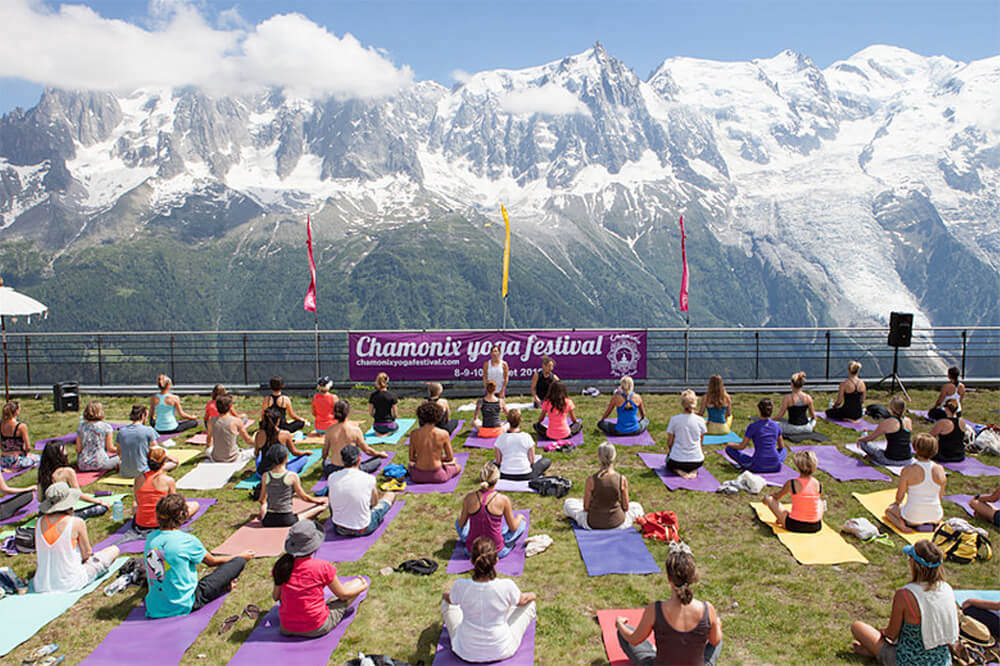 Group yoga class in the French Alps at Chamonix Yoga Festival