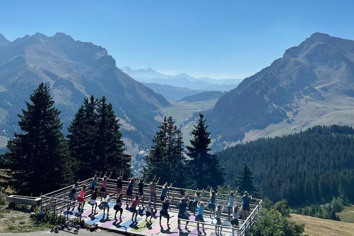 Outdoor yoga at La Clusaz Yoga Festival in Haute Savoie, French Alps